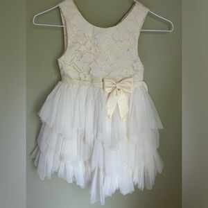 NWT American Princess ivory dress size 6. Sleeveless lace top with tulle hem.